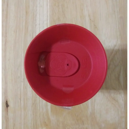 Red Harley Quinn Mad Love tumbler in Tupperware container with clear handle