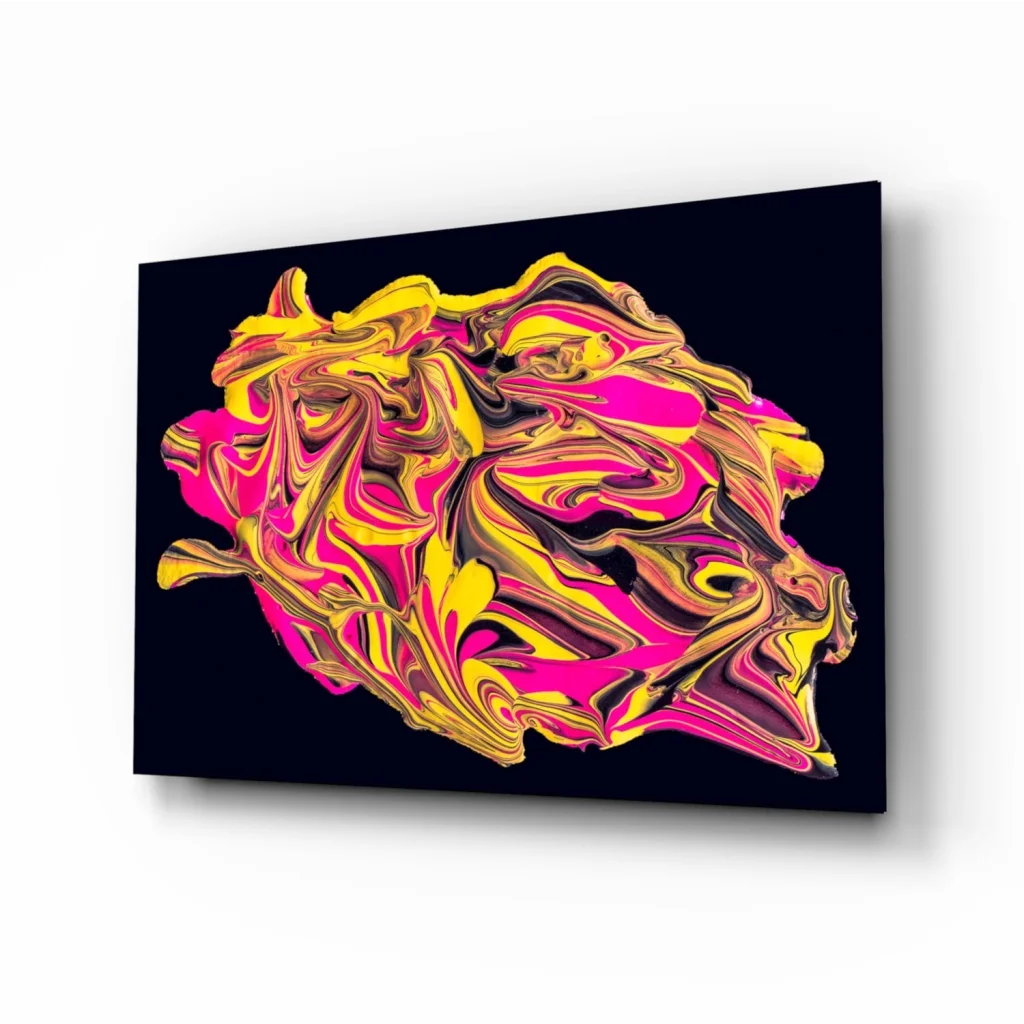 Vibrant neon pink and gold swirl glass wall art on black canvas