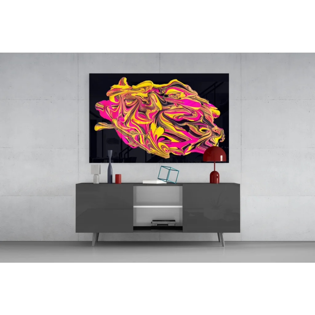Vibrant neon pink and gold swirl glass wall art on black canvas