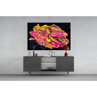 Vibrant neon pink and gold swirl glass wall art on black canvas