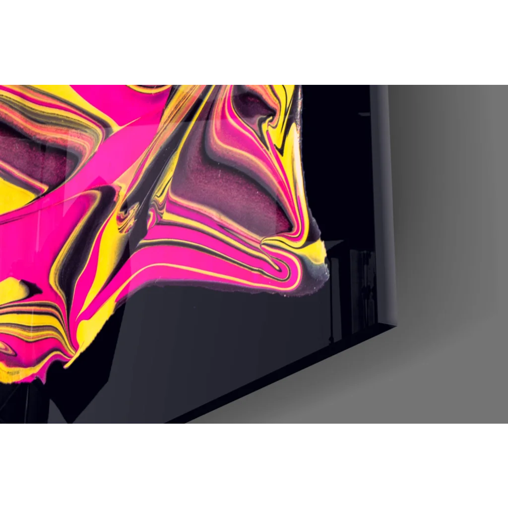 Vibrant neon pink and gold swirl glass wall art on black canvas