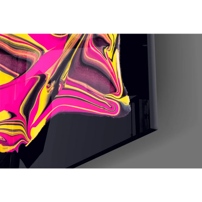 Vibrant neon pink and gold swirl glass wall art on black canvas