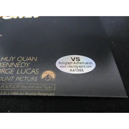 Harrison Ford signed Indiana Jones Temple of Doom autograph sticker on black background