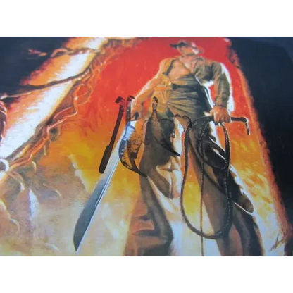 Harrison Ford Signed Indiana Jones poster with heroic pose, whip, and machete artwork