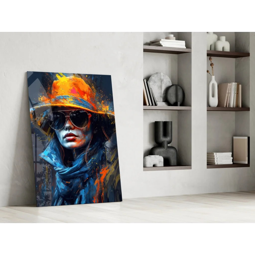 Vibrant abstract woman canvas wall art in orange hat, sunglasses, bold blue splashes