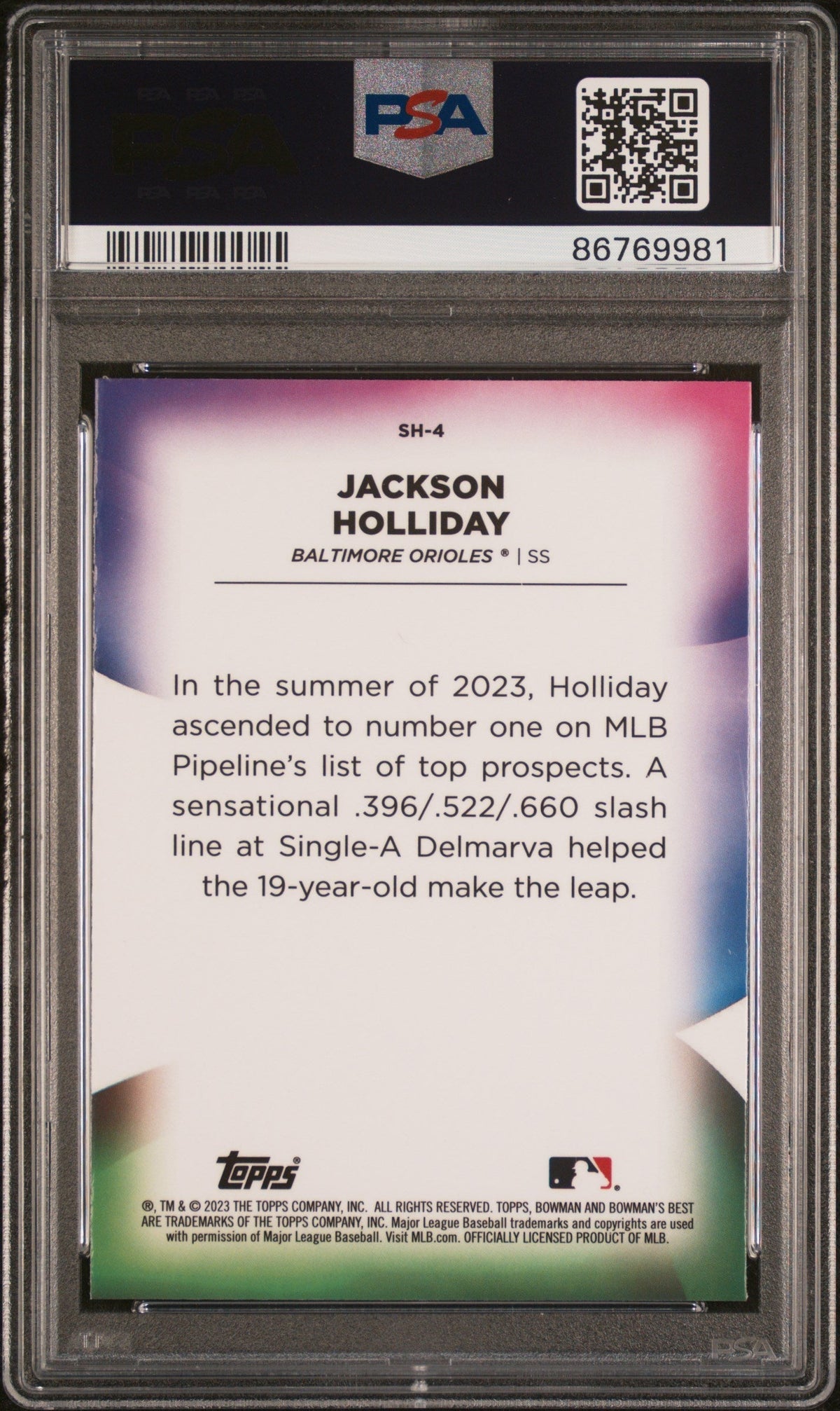 Back of PSA-graded Jackson Holliday baseball card showing text biography against gradient pink-to-blue background with Topps and MLB logos.