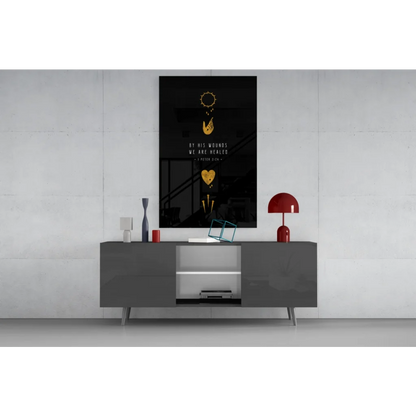 Stunning glass wall art: black framed poster with gold foil on gray console