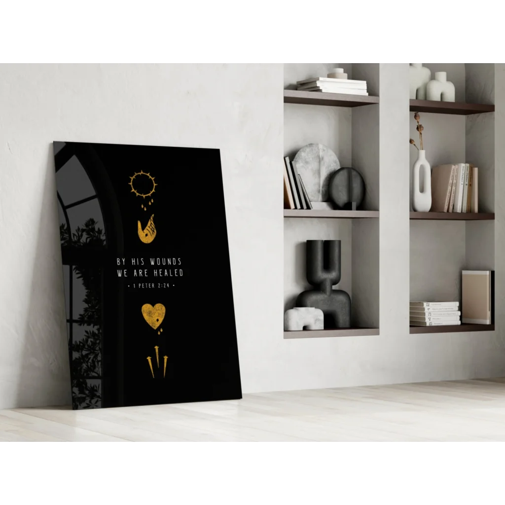 Black glass wall art with gold foil accents and 1 Peter 2:24 text