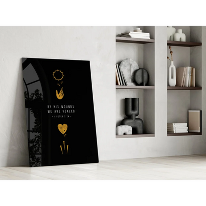 Black glass wall art with gold foil accents and 1 Peter 2:24 text