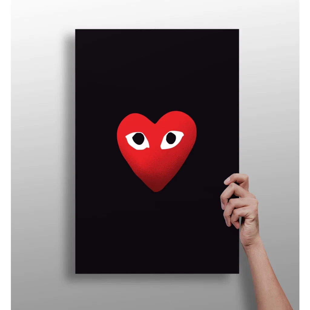 Vibrant Comme des Garçons red heart with white eyes on insigne aluminum prints