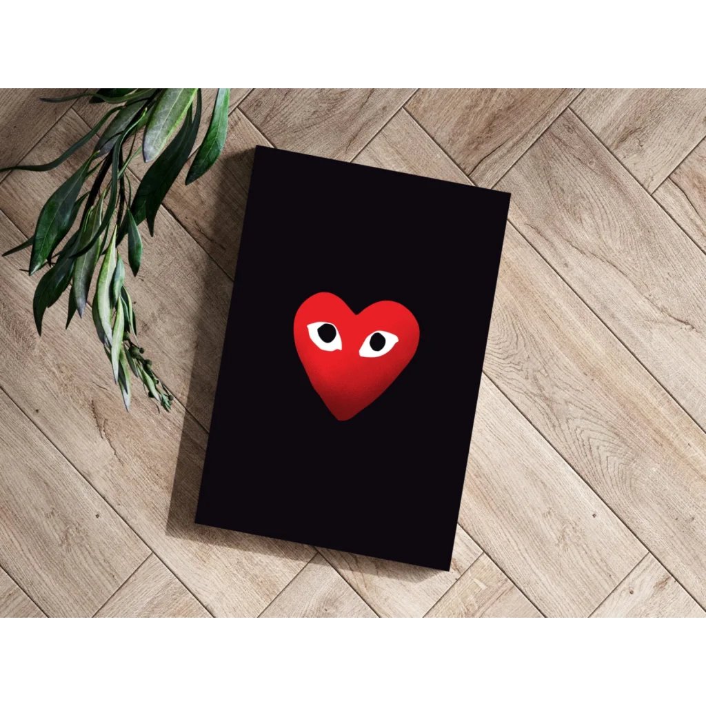 Vibrant red Comme des Garçons heart on black insigne aluminum print