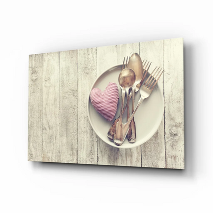 Charming rustic heart wall art with white ceramic plate, silverware, pink checkered cushion