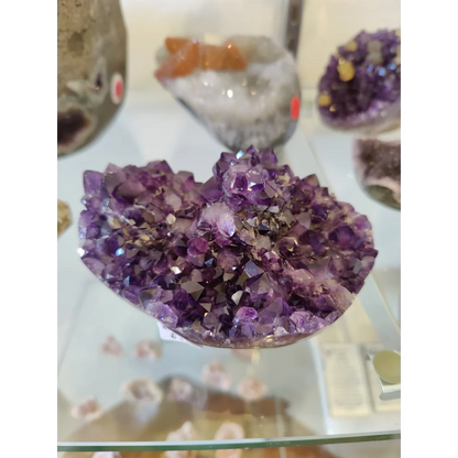 Vibrant purple amethyst heart-shaped flower formation geode sculpture