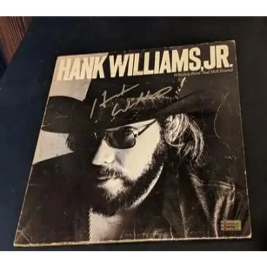 Autographed Hank Williams Jr vinyl album from the Hell Bound collection featuring Williams Jr autographed album