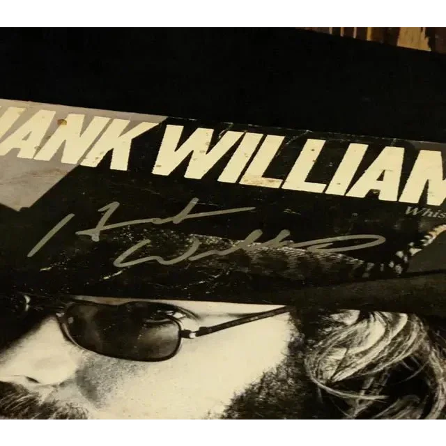 Autographed vinyl album cover for Hank Williams Jr from the Hell Bound collection