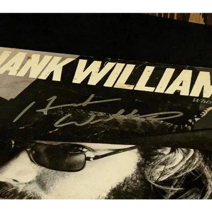 Autographed vinyl album cover for Hank Williams Jr from the Hell Bound collection