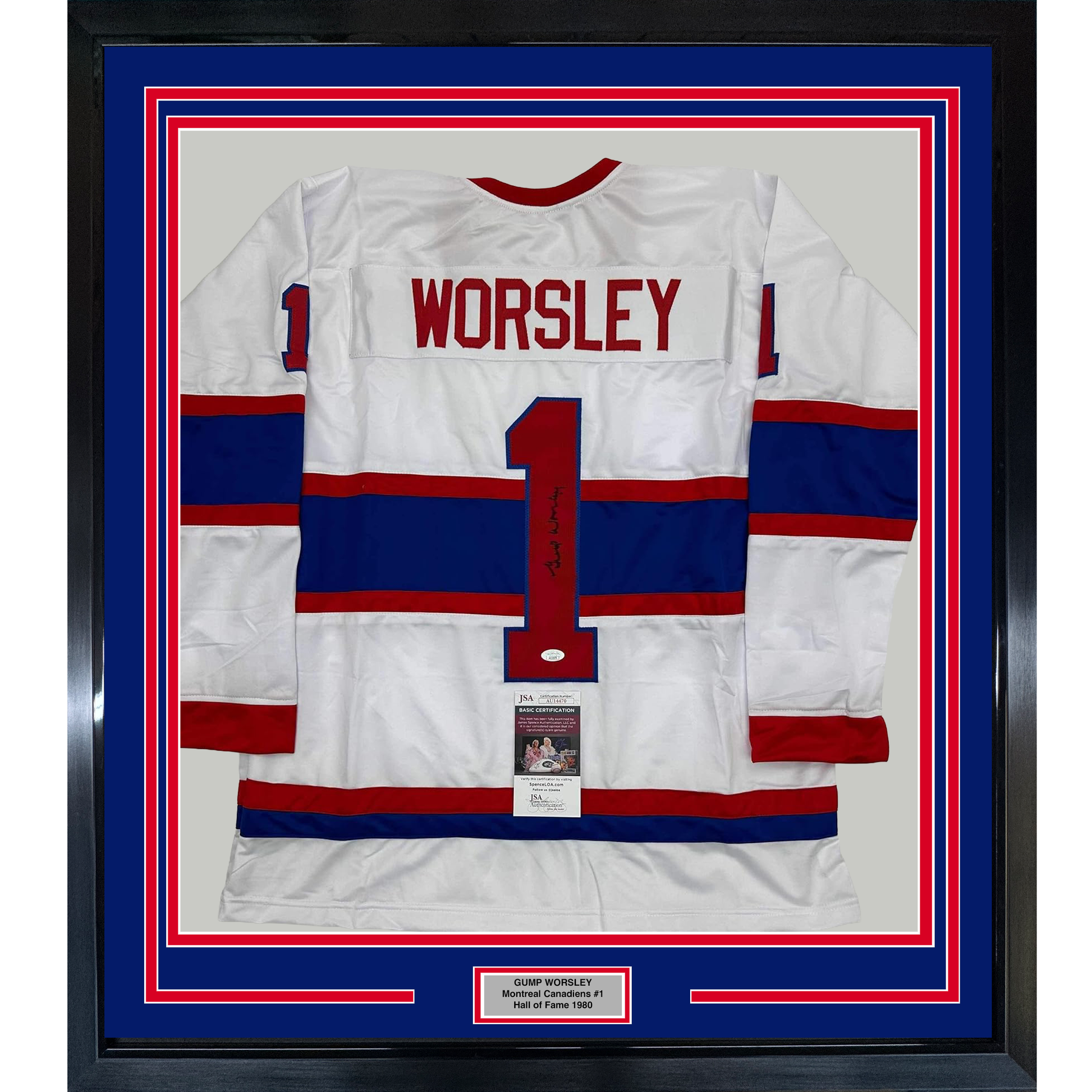 Framed white, red, and blue striped Montreal Canadiens hockey jersey number 1 with "WORSLEY" printed across the chest, mounted behind glass with authentication plaque.