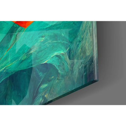 Abstract swirling teal green glass wall art with bold orange floral accent