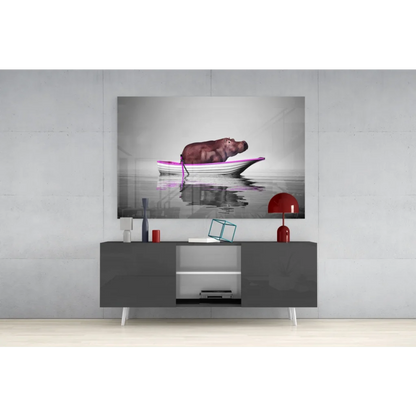 Black-and-white hippo in boat wall art canvas print
