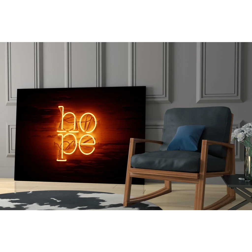 Glowing Hope neon sign wall art in warm orange light on dark textured background