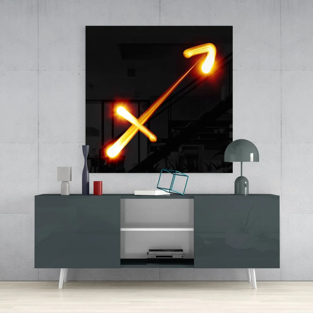 Glowing orange Sagittarius symbol on modern black tempered glass art