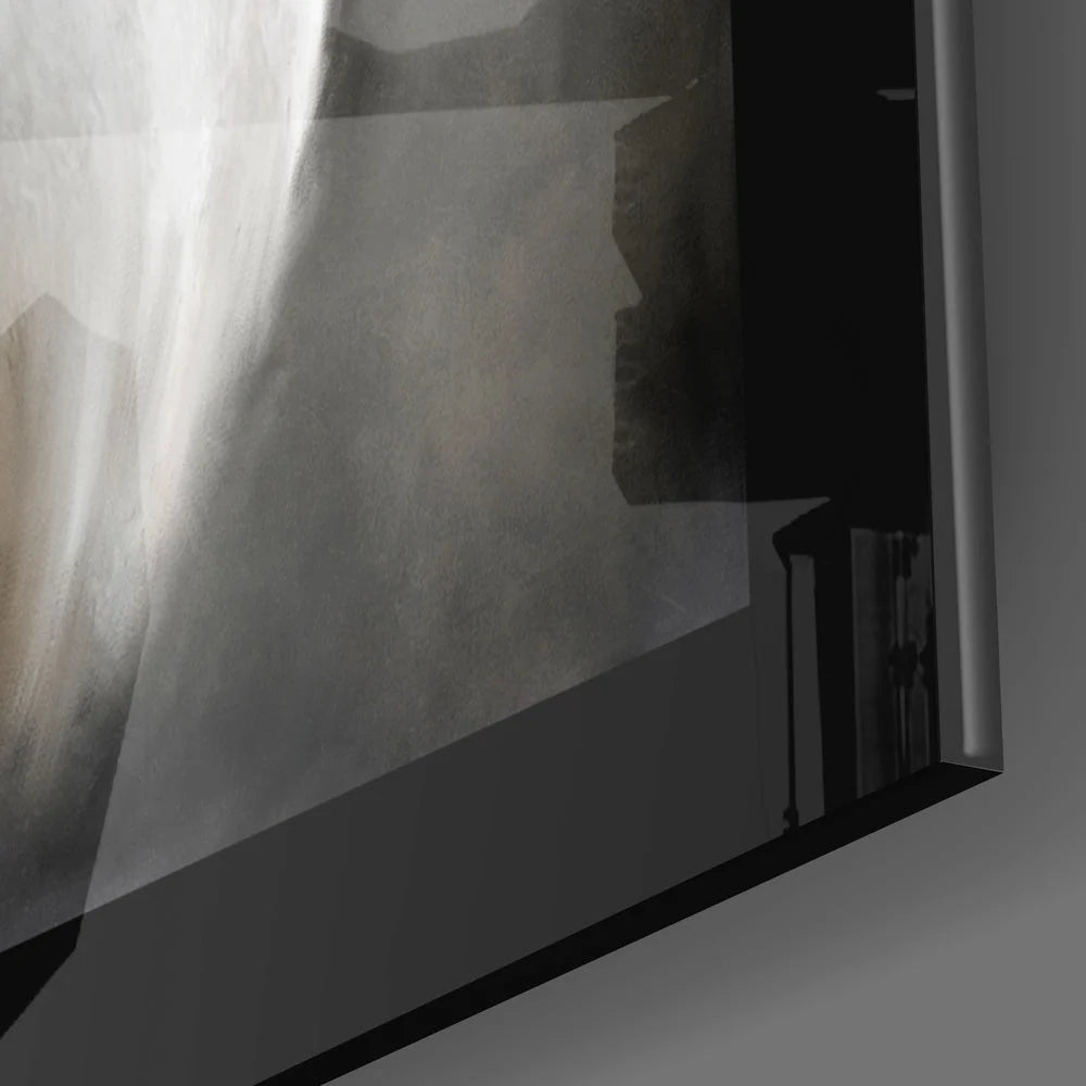 Black-framed grayscale abstract glass wall art with textured imagery