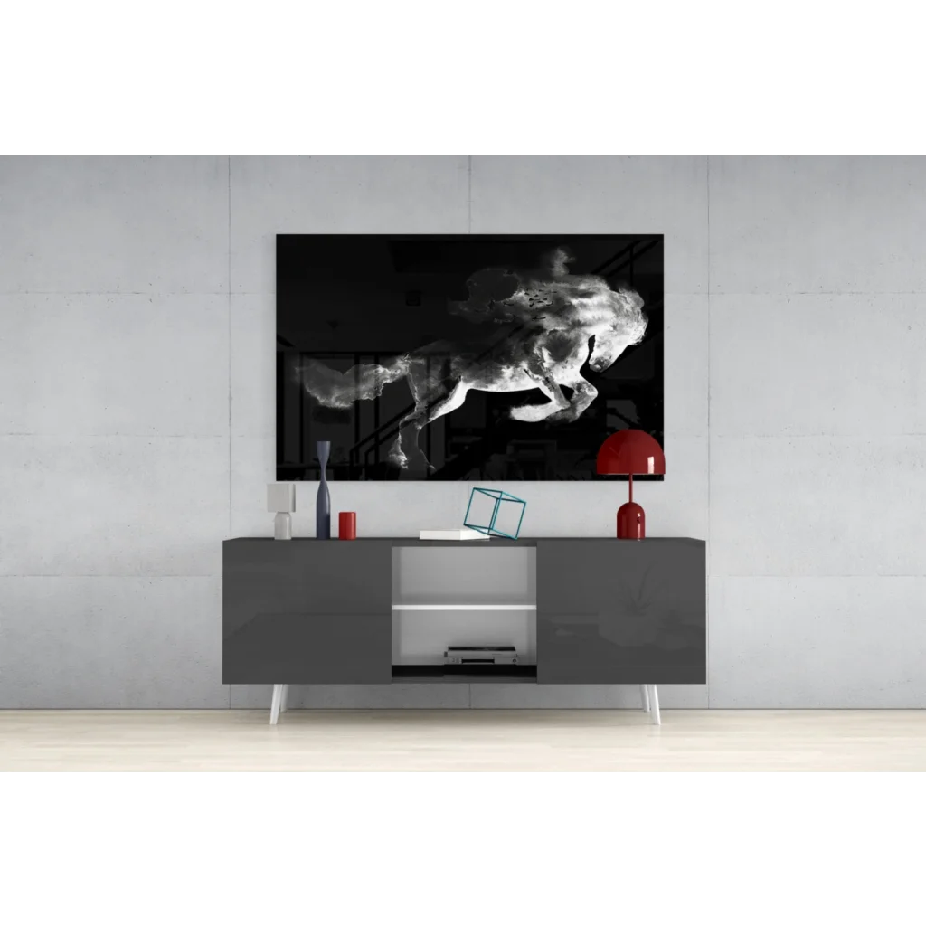 Dynamic black-and-white galloping horse glass wall art on gray console