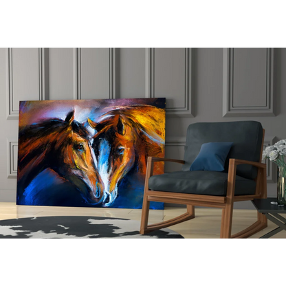 Vibrant abstract glass wall art of two horses in warm browns and golds on deep blue