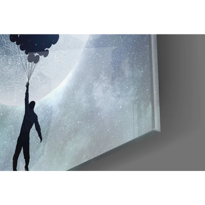 Black silhouette holding balloons on starry cosmic backdrop wall art