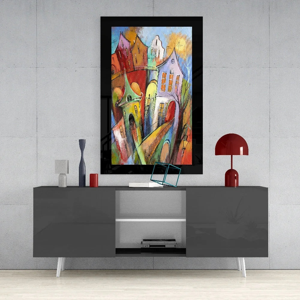 Vibrant abstract cityscape glass wall art in bold colors framed in black