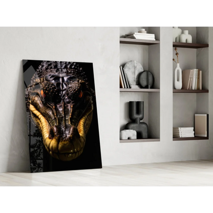 Stunning black-and-gold glass wall art of fierce crocodile head with orange eyes