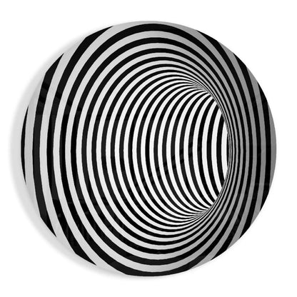 Hypnotic tunnel tempered glass art with black and white spiraling stripes