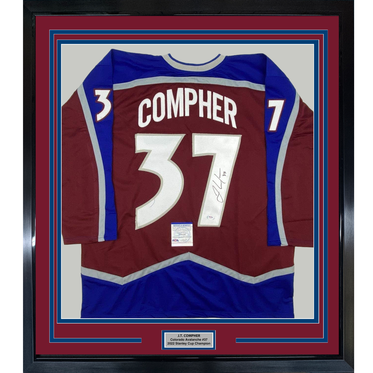 Framed maroon and blue Colorado Avalanche hockey jersey #37 signed by J.T. Compher with authentication certificate visible below.