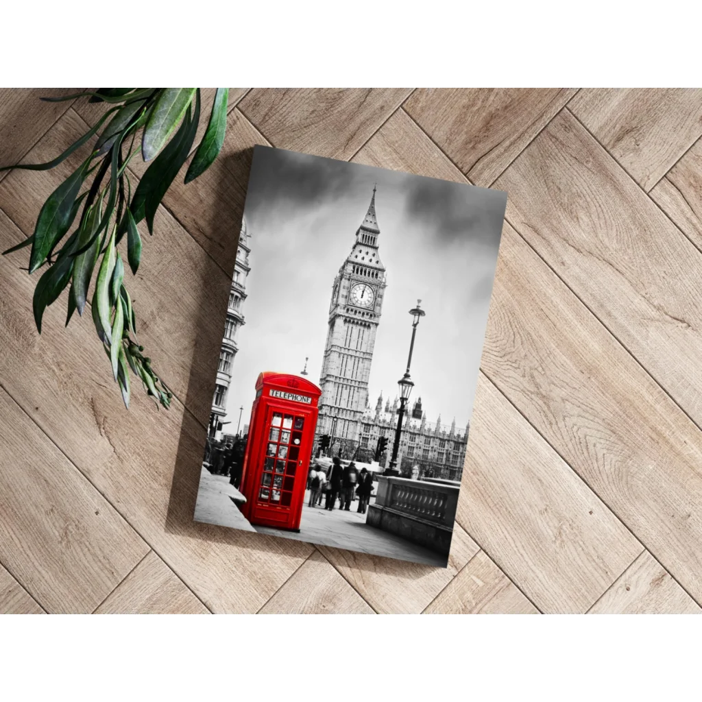 Vibrant red London phone booth canvas against black-and-white Big Ben