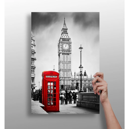 Vibrant red British phone booth against black-and-white Big Ben scene