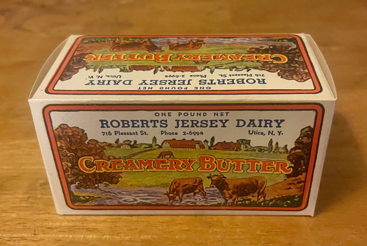 Vintage Roberts Jersey Dairy Creamery Butter box, one pound, from Utica NY, showing pastoral farm scene with cattle on wooden