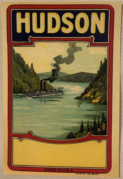 Vintage Hudson River steamboat broom label with yellow and red border, forest and water scene with steam ship, made in USA