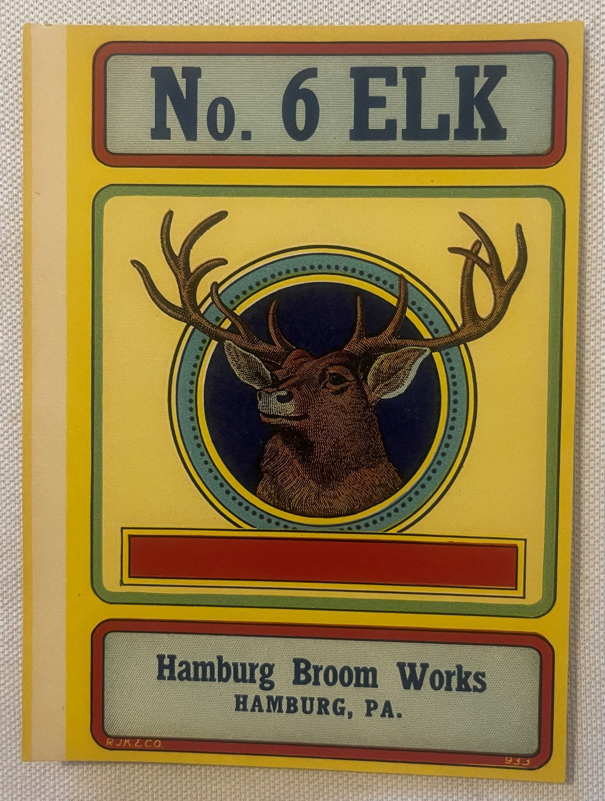 Vintage broom label featuring "No. 6 ELK" header with illustrated elk head in circular frame, yellow background, Hamburg Broo