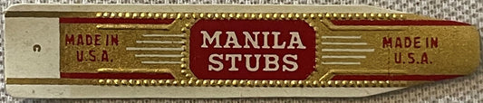 Vintage Manila Stubs cigar band label with gold and red embossed design, marked "Made in U.S.A." on both sides, against textu