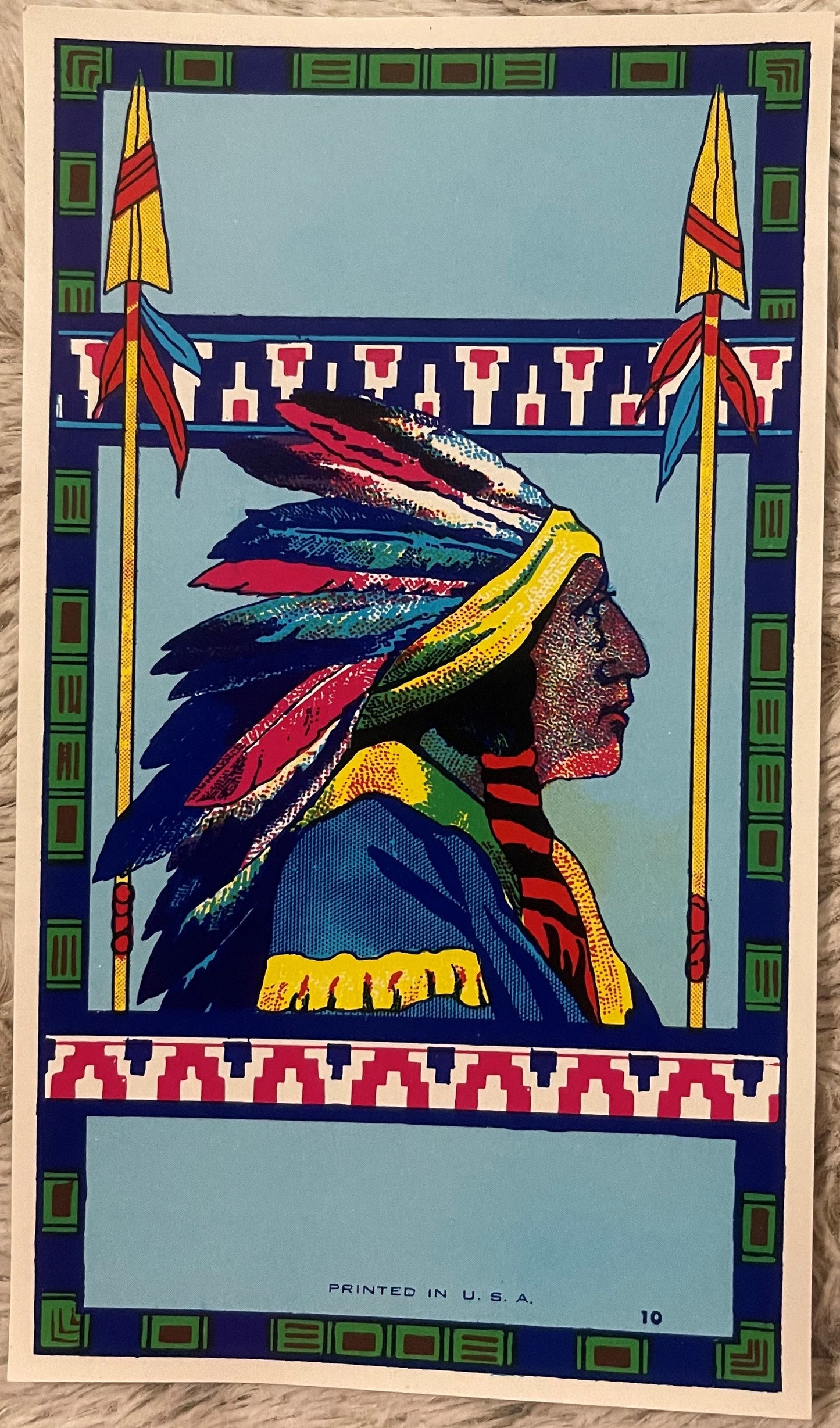 Vintage broom label featuring a Native American chief in profile wearing a colorful feathered headdress, with decorative bord