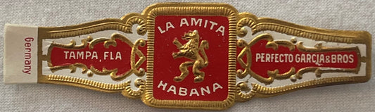 Ornate gold and red cigar band with "La Amita Habana" center emblem, "Tampa Fla" and "Perfecto Garcia & Bros" side panels, "G