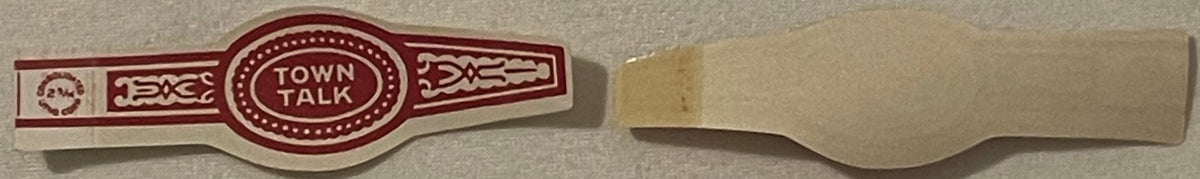 Vintage cigar band with maroon and cream design reading "Town Talk" in oval center, shown front and back against gray surface