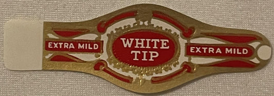Antique cigar band with red and gold embossed design reading "White Tip Extra Mild" on textured background