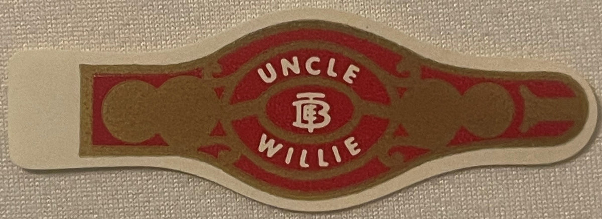 Vintage Uncle Willie cigar band with red and tan design, white lettering, and "T.E. Brooks & Co., Red Lion PA" marking on tex