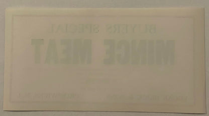 Back of the Buyers Special mince meat label: blank cream paper with no printing at all, showing only the front's BUYERS SPECIAL MINCE MEAT lettering ghosting through the sheet in mirror image