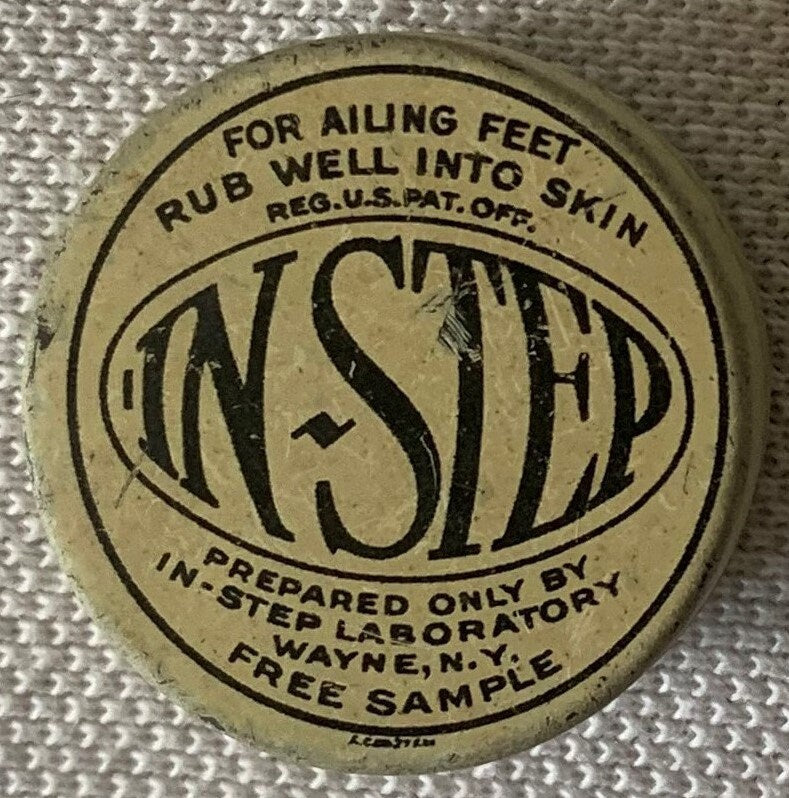 Vintage tin lid with "IN-STEP" text and instructions to rub into feet, from In-Step Laboratory in Wayne, NY, marked as free s