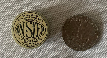 Vintage In-Step foot remedy tin next to quarter for scale, showing circular label with product name and Wayne NY address, fre