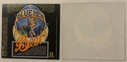 Vintage Blue Hen beer label and blank backing shown flat, featuring colonial soldier in blue uniform with rifle and gold text