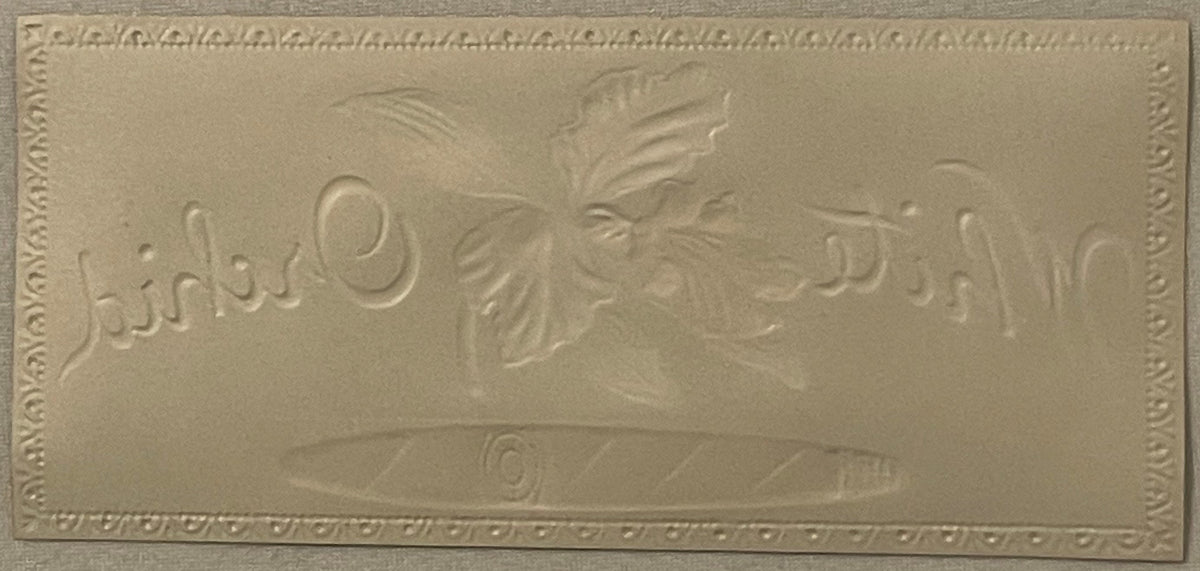 Embossed cream-colored cigar box label with gold border, featuring an orchid design and text reading "Golden's" and "Bonneauv