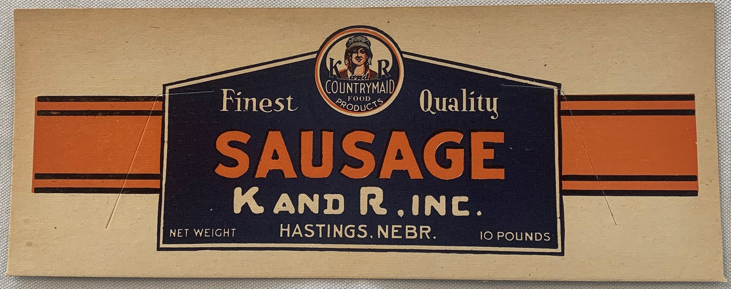Vintage meat packing label for K and R Inc sausage from Hastings, Nebraska, featuring orange and black design with Countrymai